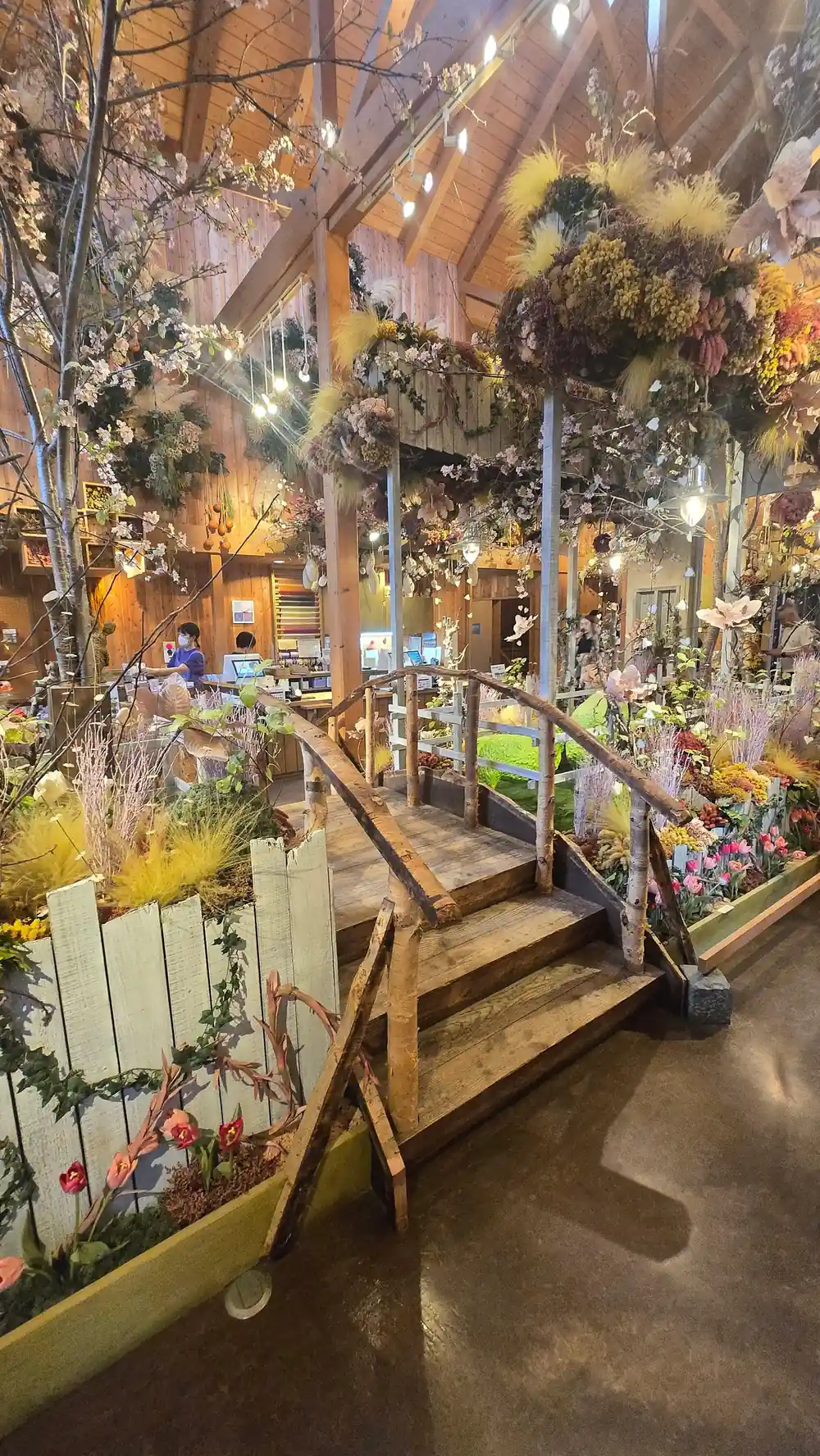 Indoor flower display garden with wooden structures