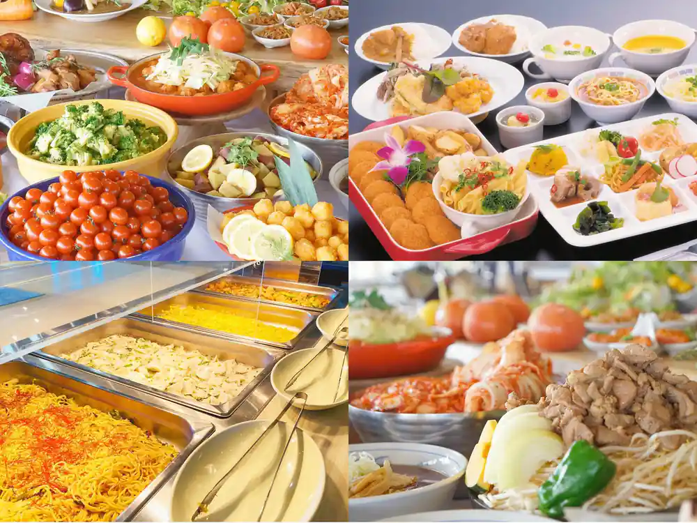 Various prepared dishes and vegetables arranged on table